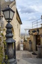 Narrow street of the cave city Uchisar, Cappadocia, Turkey Royalty Free Stock Photo