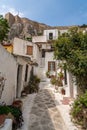 Narrow street in ancient residential district of Anafiotika in Athens Greece