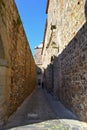 Narrow street in ancient town Caceras Royalty Free Stock Photo