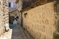 The narrow street of the authentic old town of Perast, Montenegro. Royalty Free Stock Photo