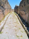 Narrow street in the city of Pompeii, Italy Royalty Free Stock Photo