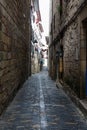 Narrow street with cobblestone
