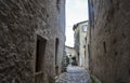 A narrow street with cobblestone road of old town Saint Paul de Vence in Provence, France Royalty Free Stock Photo