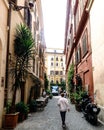 : Narrow street of cobblestones typical of Rome called