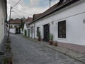 Narrow street with coble stone pavement Royalty Free Stock Photo