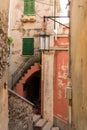 Narrow street with buildings in small colorful village Lerici in liguria, italy