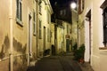 Narrow street with flowers in the old town Mougins in France. Ni Royalty Free Stock Photo