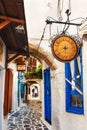 30.06.2016 - A narrow street full of stores and tradtitional restaurants in the old town of Naxos