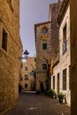 Narrow street in Girona, the beautiful medieval city in Catalonia Spain Royalty Free Stock Photo