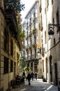 Narrow street in the Gothic quarter Barri Gotic in Barcelona, Catalonia, Spain Royalty Free Stock Photo