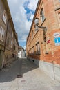 Narrow street in the historic old city of Winterthur in Switzerland with traditional brick industrial houses