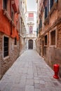 Narrow street in the historical center of Venice, Italy Royalty Free Stock Photo