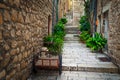 Narrow street in Hvar old town, Dalmatia, Croatia Royalty Free Stock Photo