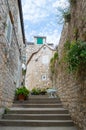 Narrow street in Hvar town, Croatia Royalty Free Stock Photo