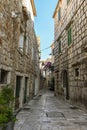 Narrow street of Jelsa town, Hvar island, Croatia Royalty Free Stock Photo