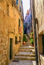 Narrow street in Korcula on island Korcula Royalty Free Stock Photo