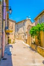 Narrow street in Lacoste village in France Royalty Free Stock Photo