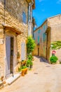 Narrow street in Lacoste village in France Royalty Free Stock Photo