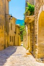 Narrow street in Lacoste village in France Royalty Free Stock Photo