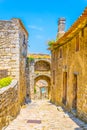 Narrow street in Lacoste village in France Royalty Free Stock Photo