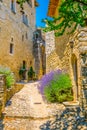 Narrow street in Lacoste village in France Royalty Free Stock Photo