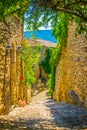 Narrow street in Lacoste village in France Royalty Free Stock Photo