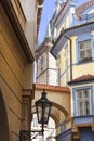 Narrow street with lantern, view on tower of Old Town Hall, Prague, Czech Republic Royalty Free Stock Photo