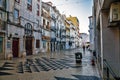 Narrow street local Shops in Alfama Lisboa district. Lisbon, Portugal Royalty Free Stock Photo