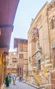 The narrow street with medieval mosque in old Cairo, Egypt