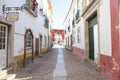 Narrow street in the medieval Portuguese City of Obidos Royalty Free Stock Photo