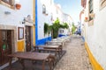 Narrow street in the medieval Portuguese City of Obidos Royalty Free Stock Photo