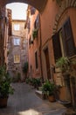 Narrow street of medieval town of Orte, Italy