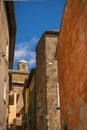 Narrow street of medieval town of Orte, Italy