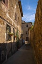 Narrow street of medieval town of Orte, Italy