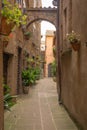 Narrow street of medieval town of Orte, Italy