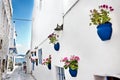 A narrow street, the mediterranean sea in the background, Bodrum