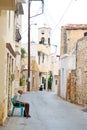 The narrow street in the old part of Malia. Royalty Free Stock Photo