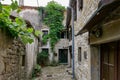 Narrow street and old residential houses of alleys in the Croatian artists' village of Groznjan