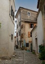 Narrow street and old residential houses of alleys in the Croatian artists' village of Groznjan Royalty Free Stock Photo