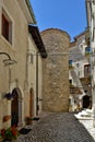 Narrow street among the old stone houses of Civitella Alfedena a medieval village in Abruzzo