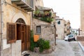 Narrow street in the old town of Cefalu in Sicily, Italy Royalty Free Stock Photo