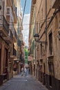 Narrow street in the old town of Palma de Mallorca, Spain Royalty Free Stock Photo