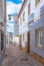 Narrow street of the old town at Portuguese town Tavira Royalty Free Stock Photo