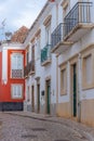 Narrow street of the old town at Portuguese town Tavira Royalty Free Stock Photo