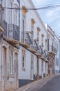 Narrow street of the old town at Portuguese town Tavira Royalty Free Stock Photo