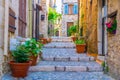 A narrow street in the old town of Saint Paul de Vence, France Royalty Free Stock Photo