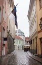 Narrow street in the old town in Tallinn Estonia in a rainy day Royalty Free Stock Photo