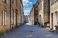 Narrow street with old traditional houses in histoical part of D Royalty Free Stock Photo