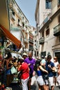 Narrow Street Packed With Tourists and Vendors in Amalfi, Italy