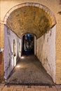 Narrow street passage at Carloforte harbor, San Pietro island, Sardinia Royalty Free Stock Photo